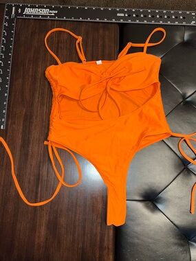 Bright Orange One-Piece Swimsuit with Side Tie Details